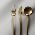Gold Stainless Steel Cutlery Set with Forks, Knives, and Spoons for Dining Table Use